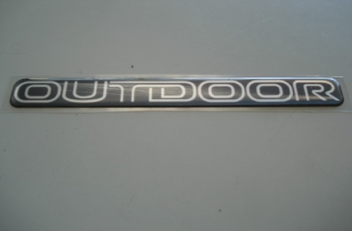 Emblema 'Outdoor' L200 Pajero Outdoor (Vazado)